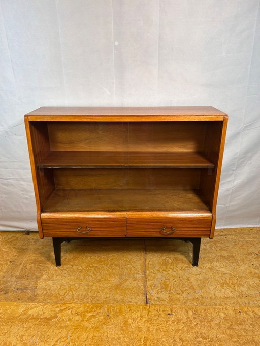 Mid-Century Retro Vintage Teak Bookcase by Jentique – 1960s  This elegant mid-century teak bookcase by Jentique fine example