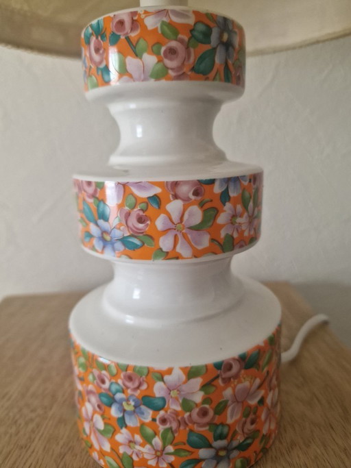 Vintage oranje bloemenlamp