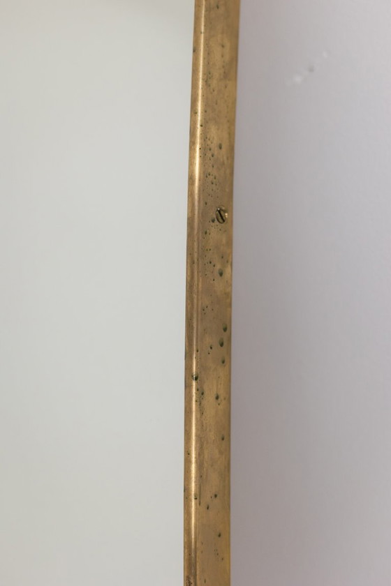 Image 1 of Specchio con cornice in ottone dorato. Anni '80.