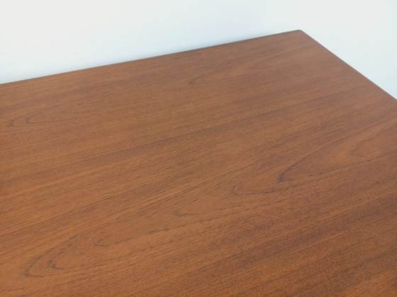 Image 1 of Vintage Scandinavian rectangular dining table by Ejvind A. Johansson from the 50s and 60s in teak with integrated extensions