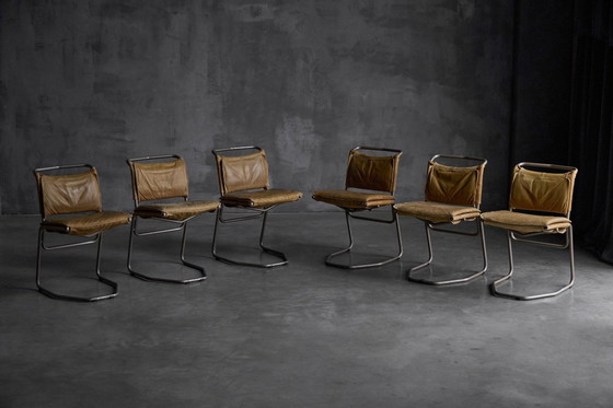 Image 1 of Eetkamerstoel van leer en staal, ontworpen door Raymond Rombouts, België, 20e eeuw.