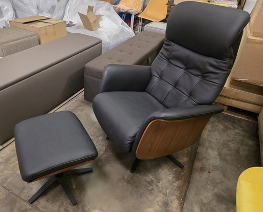 Fauteuil / relax réglable en cuir noir + pouf