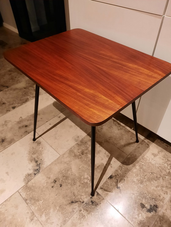 Image 1 of 1970s table with rotating top.