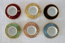 6 tazze e piattini vintage di Limoges con decorazioni floreali e dorate.