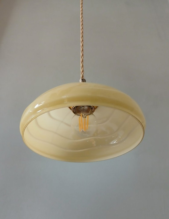 Image 1 of Set (2) Antique ceiling lamps in pastel brown/yellow color.