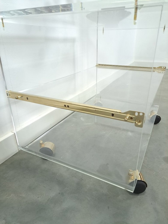 Image 1 of Space age plexiglas trolley met messing