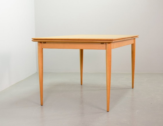 Image 1 of Large Mid-Century Design Extendable Solid Beech Wooden Dining Table in style of Arno Lambrecht. Germany, 1950s.