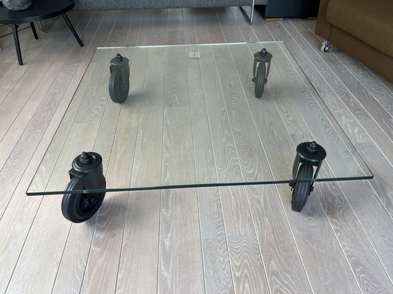 Image 1 of Fontana Arte glazen salontafel op wielen