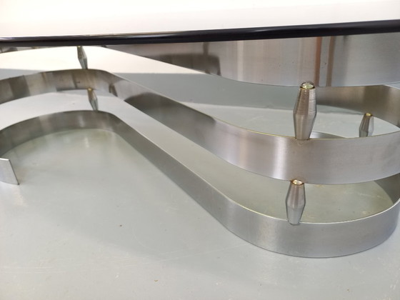 Image 1 of Vintage ovale salontafel van rookglas en verchroomd metaal uit de jaren 70.