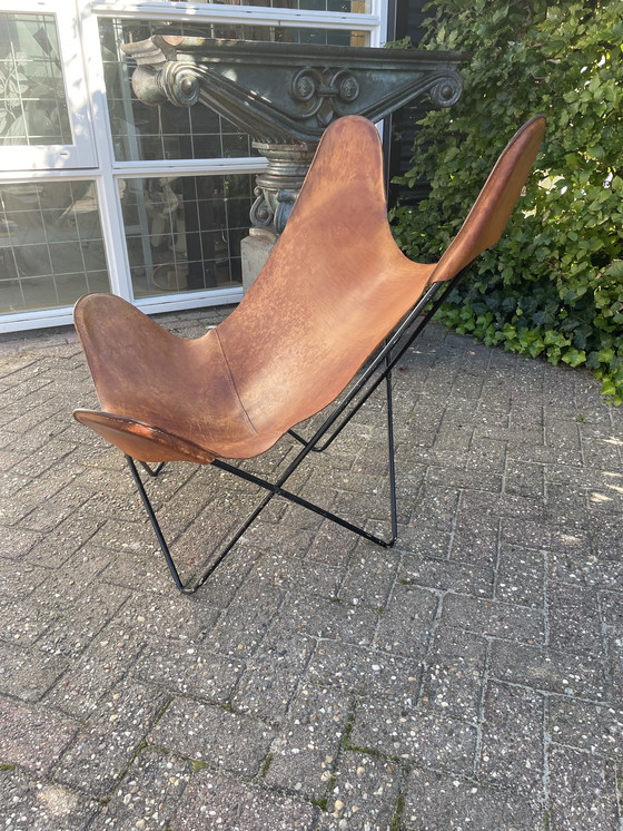 Image 1 of Jaren 60 vlinderstoel met tuiglederen zitting