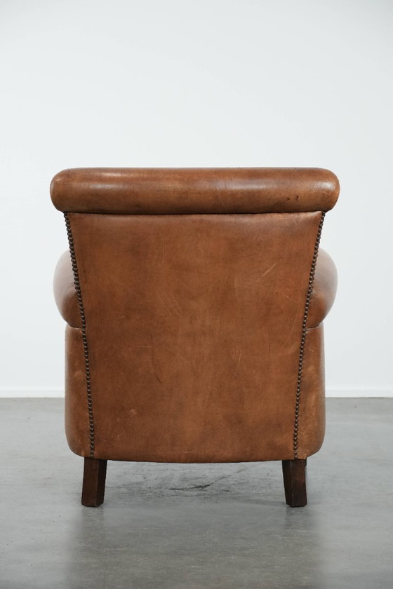 Image 1 of Poltrona vintage in pelle di pecora con carattere