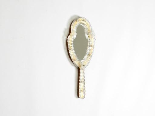 Beautiful Venetian Mid-Century Modern hand or wall mirror with Murano glass rosettes. Made in Italy.