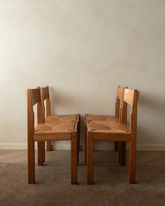 Image 1 of Mid-century eetkamerstoelen van iepenhout en riet van Maison Regain, jaren 70, set van 4