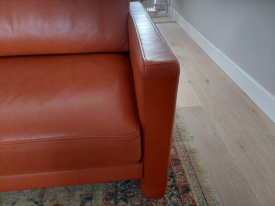Image 1 of Rolf Benz 4-seater leather sofa, orange/terracotta.