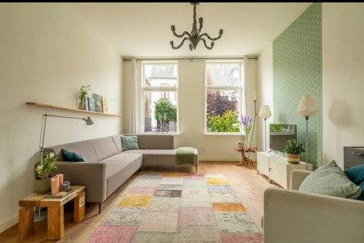 Canapé d'angle avec pouf
