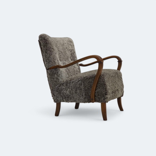1960s Gerestoffeerde Deense Fauteuil in Nieuw-Zeelandse Echte Schapenvacht