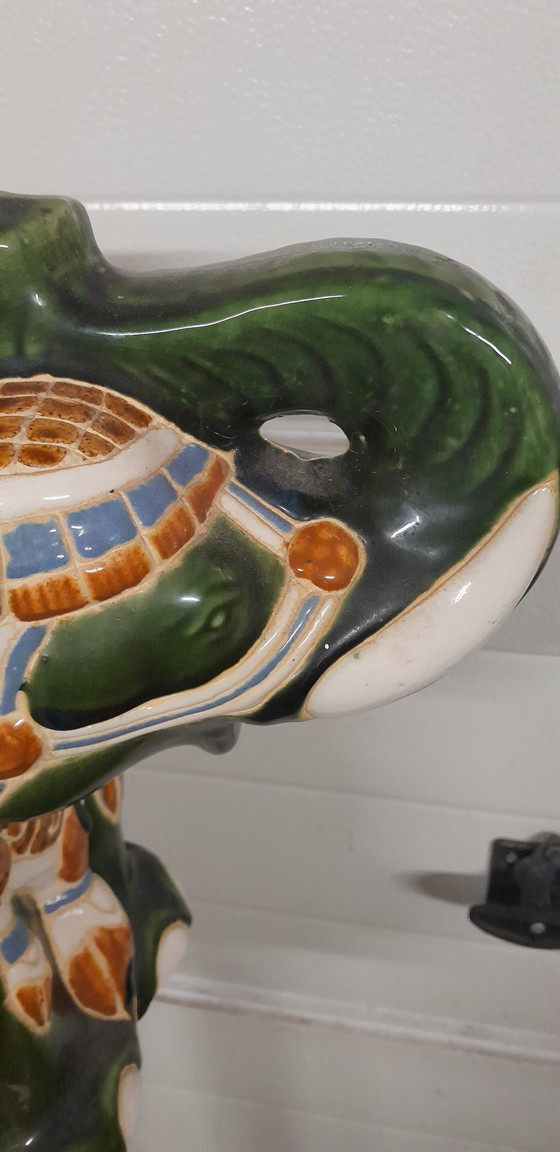 Image 1 of Tavolo in ceramica con pianta di elefante