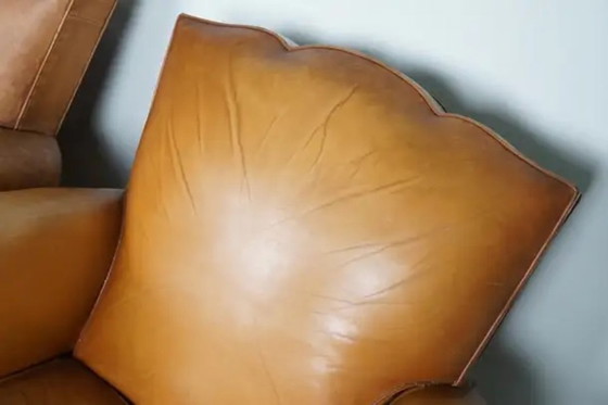 Image 1 of Set Franse cognackleurige leren clubfauteuils met ‘moustache’-rugleuning, jaren 1950