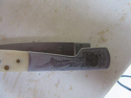 Image 1 of Vendetta Korsisches Taschenmesser, Klappmesser aus A20-Stahl und Knochen, mit Mohrenkopf- und Wildschweinmotiven, Vintage