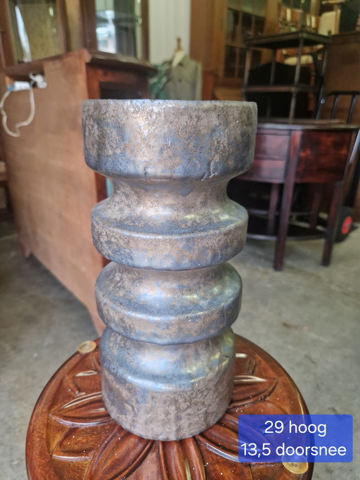 Beautiful earthenware bronze-colored vase