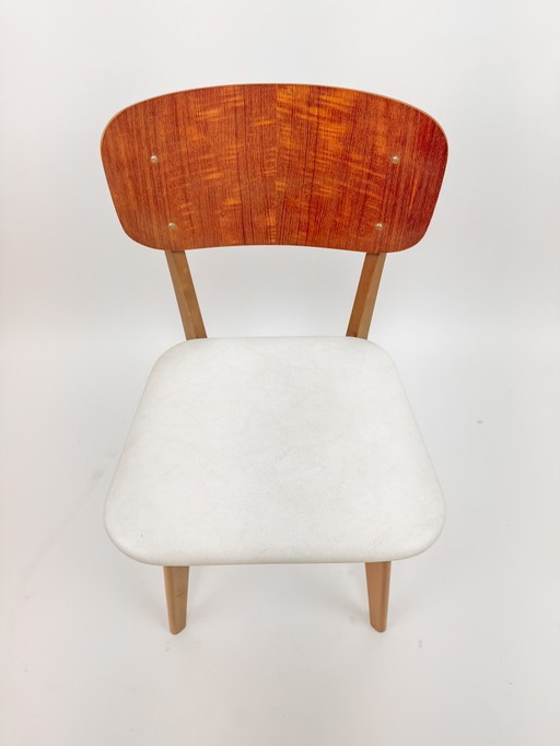 Vintage dining chair with white leatherette seat