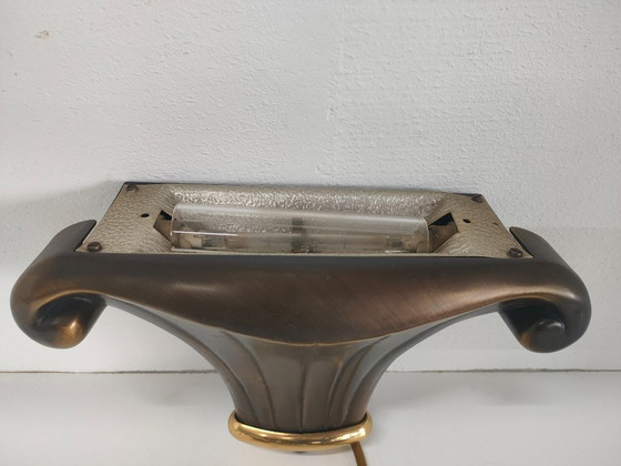 Image 1 of Lampada da parete in stile Art Déco Hollywood Regency, color oro e marrone, con illuminazione alogena.