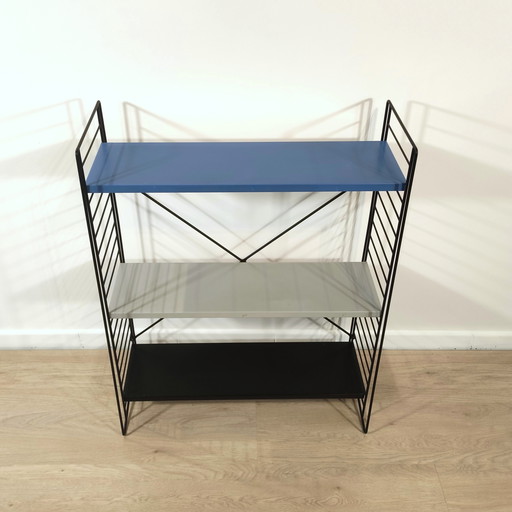 Mid century free standing rack with metal shelves by A. Dekker for Tomado