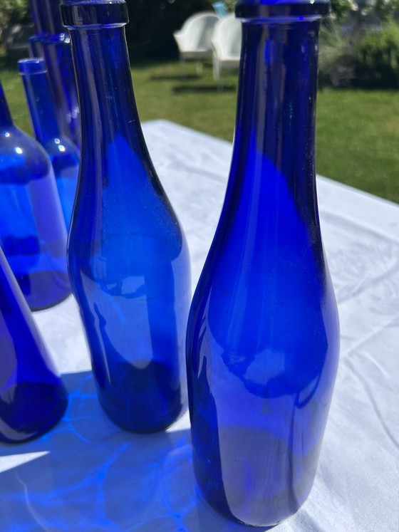 Image 1 of Set van 6 kobaltblauwe glazen flessen/vazen/vintage blauwe decoraties