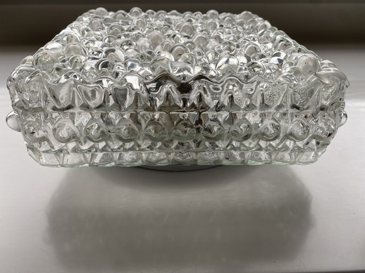 Vintage ceiling lamp made of thick glass with a spherical structure