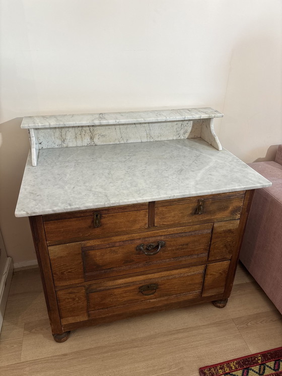 Image 1 of Antique chest of drawers with marble top