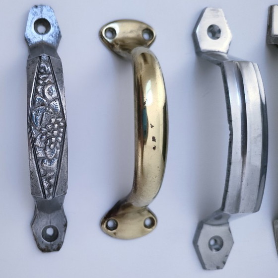 Image 1 of sette maniglie Art Déco in argento e ottone