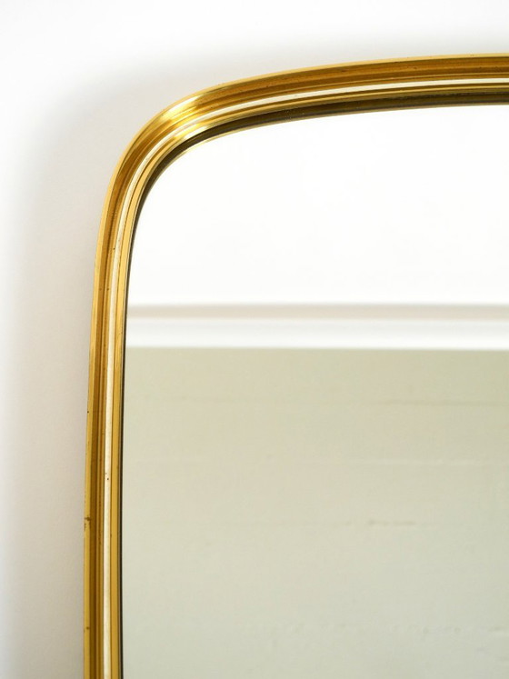 Image 1 of A pair of rare original Mid Century Modern "Münchener Zierspiegel" wall mirrors with heavy brass frames
