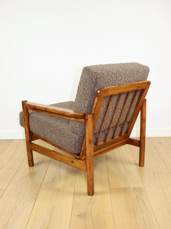 Image 1 of Houten fauteuil ontworpen door Z. Baczyk, bruin vintage chocoladebruin bouclé lamsleer