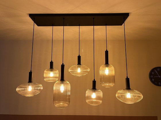Image 1 of Plafondlamp met 7 glazen lampenkappen