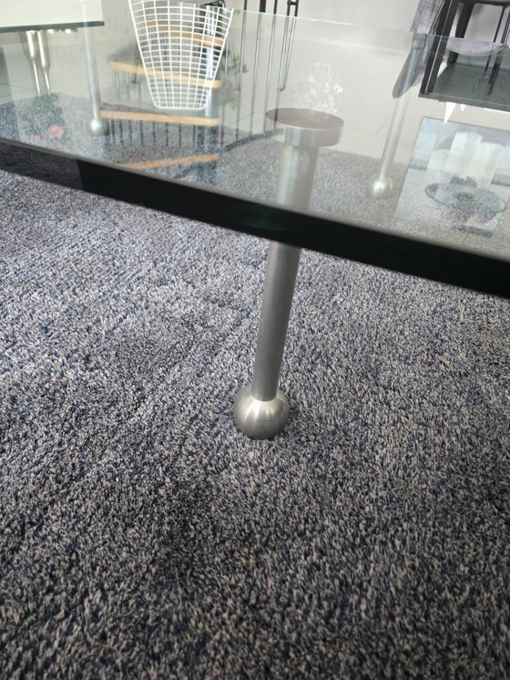Image 1 of Design glass table with stainless steel legs; square model