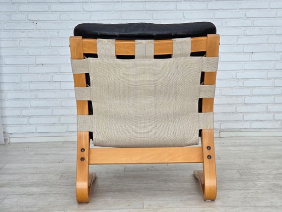 Image 1 of Sillón de diseño noruego, años 70, modelo "Kengu", cuero, madera curvada.