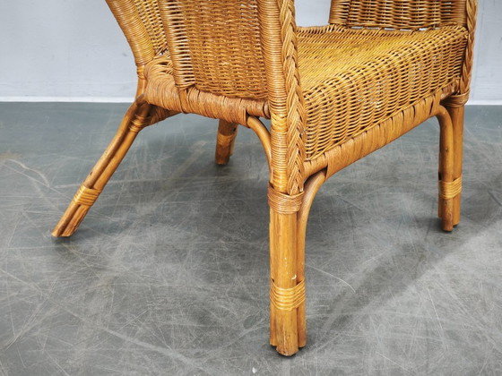 Image 1 of Conjunto de salón italiano de ratán y mimbre de los años 50, con cuatro sillones y mesa.