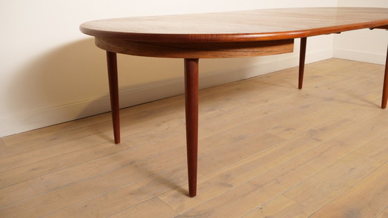 Image 1 of Table de salle à manger ronde vintage | extensible | teck | 130 - 240 cm