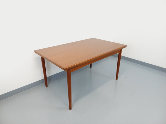 Image 1 of Scandinavian 60's vintage Dyrlund rectangular teak dining table with extensions