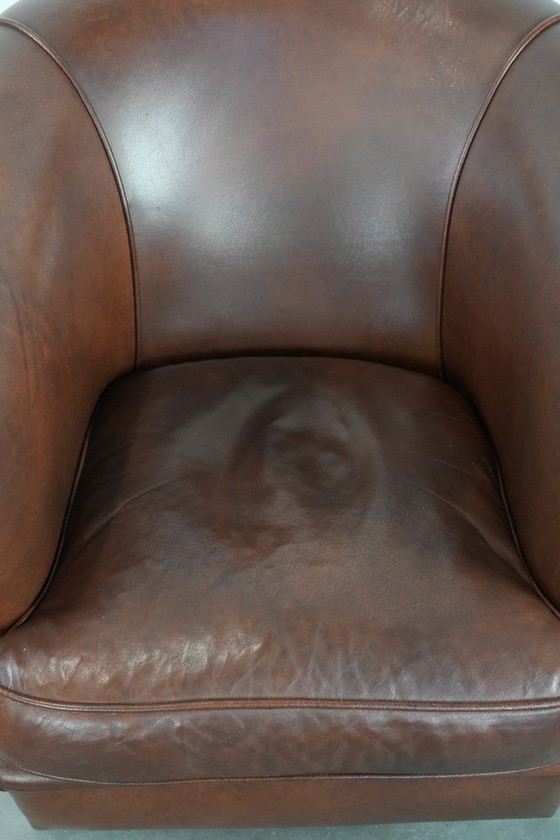 Image 1 of Cognac-colored cowhide leather club armchair in English style with a luxurious appearance