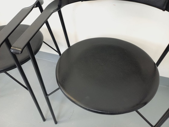 Image 1 of Set di 4 poltrone vintage di design italiano in metallo nero e similpelle nera degli anni '80