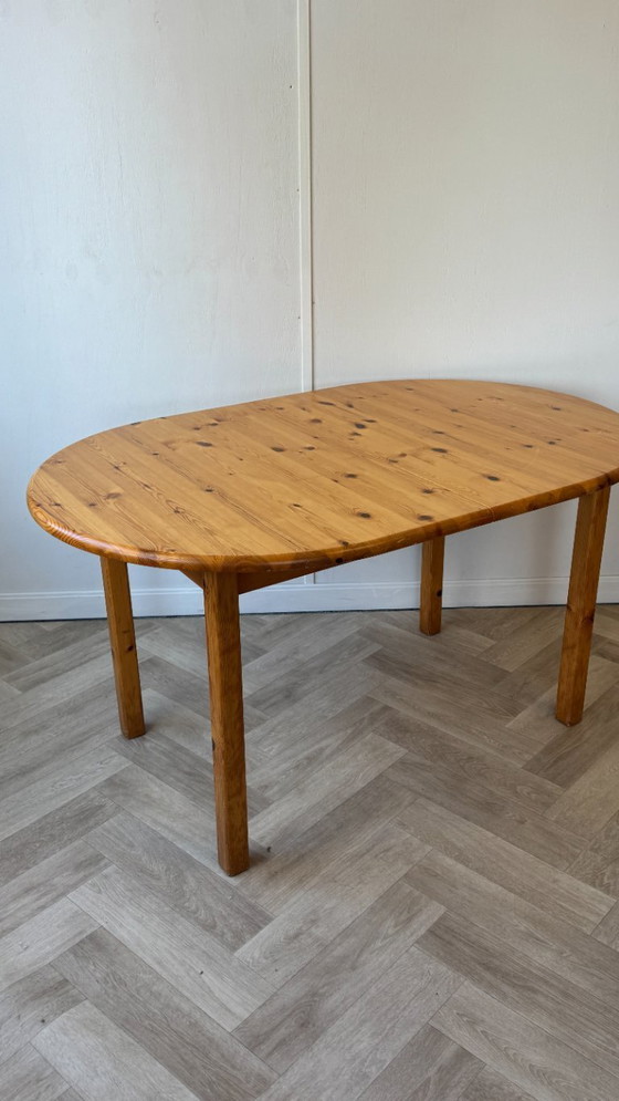 Image 1 of Oval pine extendable table.