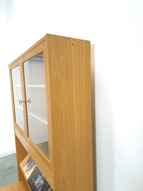 Image 1 of Tall LP display case with glass doors and reading shelf from Sweden