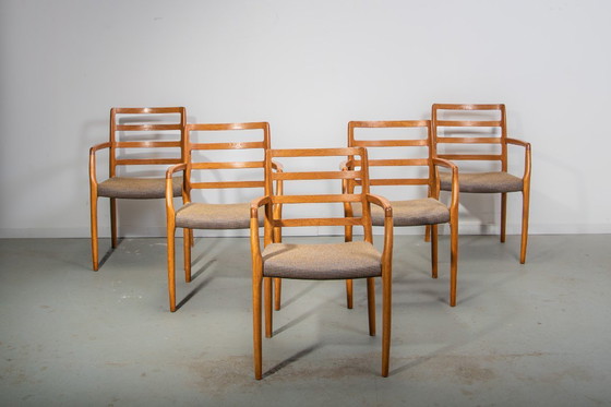 Image 1 of J.L. Mollers Model 68 armchairs in Oak with original fabric. Made in Denmark Circa 1990