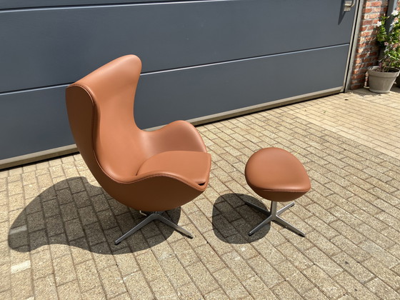 Image 1 of 2x Fritz Hansen Egg Chair + Ottoman en cuir Cognac NEUF !!!