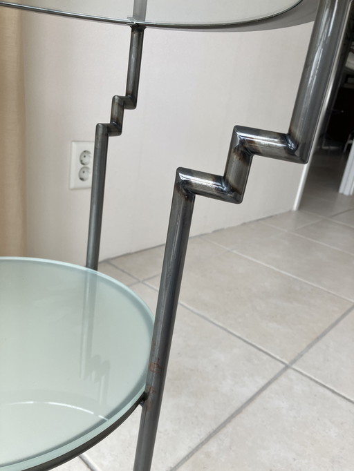 Glass side table (design, brand unknown)