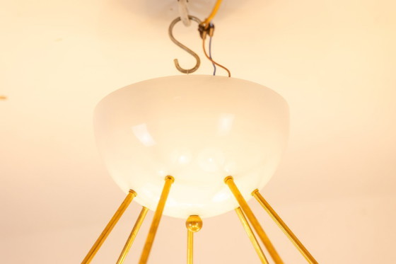 Image 1 of Stilnovo. Lámpara de araña de latón dorado y metal lacado en blanco. Contemporánea.