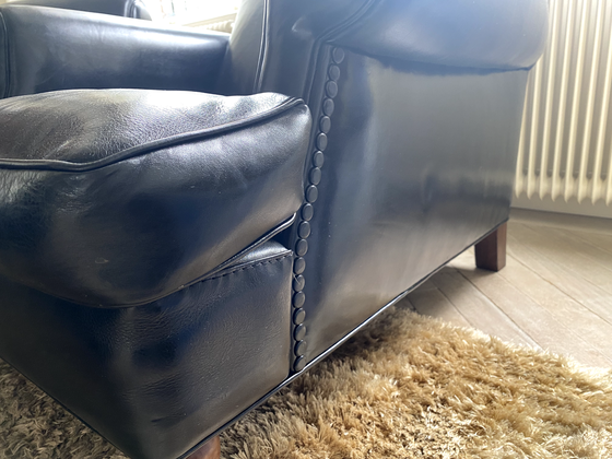 Image 1 of Baxter fauteuil + hocker, model Charlotte Longe (zwart leer)