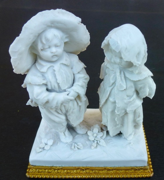 Image 1 of Luxury sponge porcelain figurine with gold leaf finish.