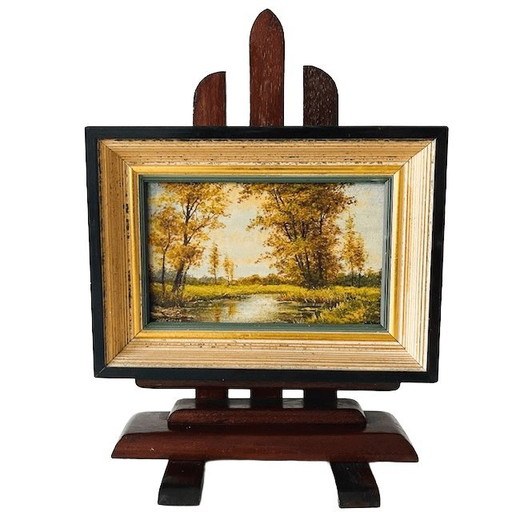 Peinture à l'huile vintage représentant un paysage forestier, sur socle, signée années 1960.